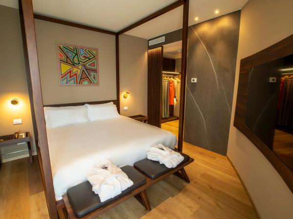 UNAHOTELS MH Matera : photo 2 de la chambre suite junior