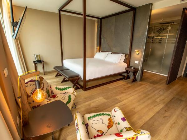 UNAHOTELS MH Matera : photo 1 de la chambre suite junior