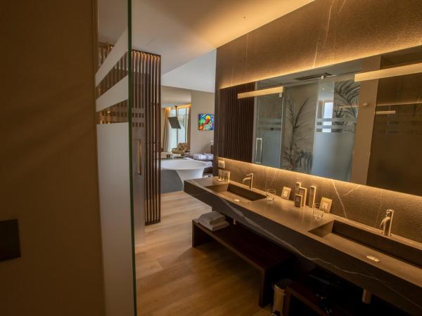 UNAHOTELS MH Matera : photo 3 de la chambre suite décloisonnée