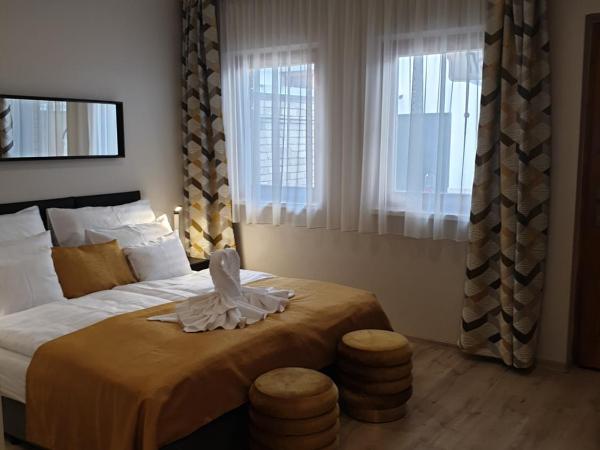 Indium City Panzió : photo 1 de la chambre chambre deluxe (2 adultes + 1 enfant)