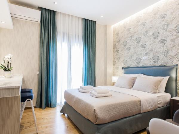 Nicholas Point Apartments and Rooms : photo 1 de la chambre studio lit queen-size de luxe