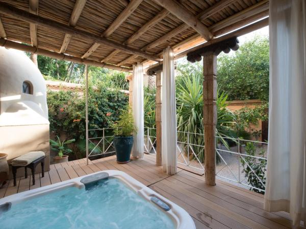 Les Deux Tours : photo 4 de la chambre suite avec jacuzzi