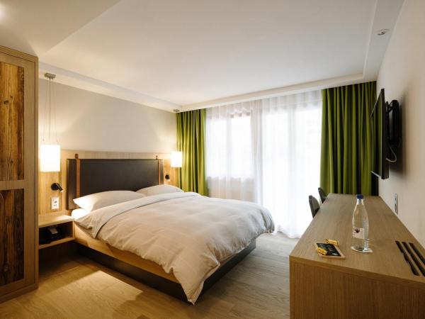 Adler Adelboden : photo 2 de la chambre chambre double ou lits jumeaux