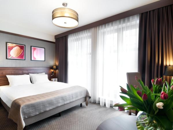 Golden Tulip Krakow City Center : photo 1 de la chambre chambre double