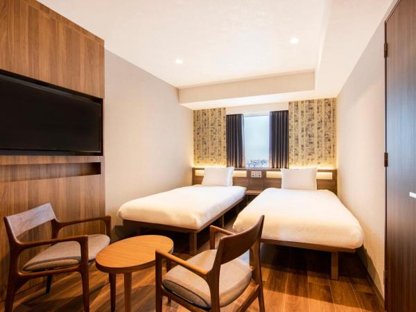 karaksa hotel grande Shin-Osaka Tower : photo 1 de la chambre hébergement lits jumeaux supérieur - Étage supérieur
