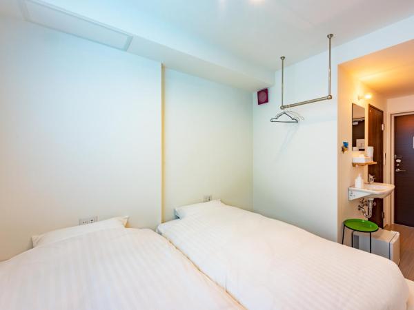 plat hostel keikyu sapporo sky : photo 3 de la chambre chambre lits jumeaux standard