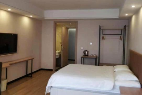 GreenTree Inn Chengdu high-tech Development West Zone Shidai Tian Street Express Hotel : photo 4 de la chambre citoyens chinois continentaux - chambre lit queen-size de luxe