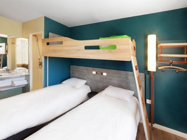 ibis budget Porte D'Orleans : photo 2 de la chambre chambre triple avec 3 lits simples