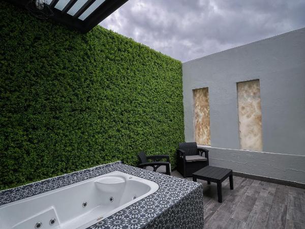 Fato Hotel : photo 5 de la chambre suite avec baignoire spa