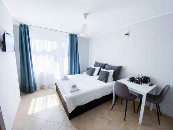 Pokoje Gościnne Przy Molo : photo 2 de la chambre chambre double avec salle de bains privative