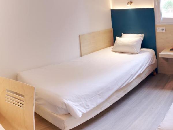 Kyriad Direct Perpignan - Aeroport : photo 4 de la chambre chambre lits jumeaux