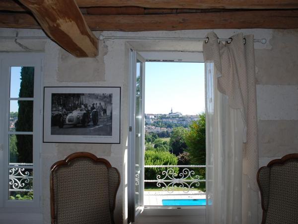 Domaine du Champ Fleuri : photo 5 de la chambre chambre lit queen-size - vue sur piscine