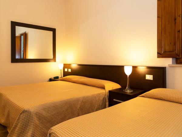 Villa Montarioso : photo 8 de la chambre chambre triple confort