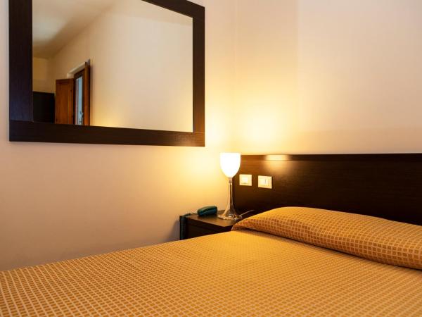 Villa Montarioso : photo 7 de la chambre chambre triple confort