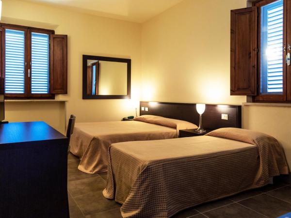 Villa Montarioso : photo 1 de la chambre chambre triple confort