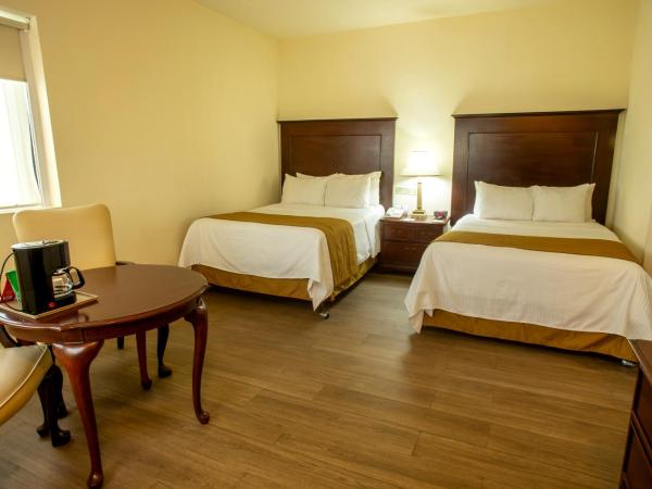 Hotel Plaza Calzada : photo 3 de la chambre chambre double avec 2 lits doubles - non-fumeurs