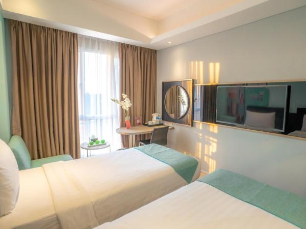 Brits Hotel Puri Indah : photo 2 de la chambre chambre double ou lits jumeaux standard