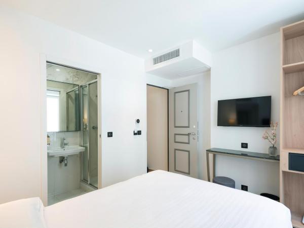 HOTEL AU COEUR DES ARTS ET METIERS : photo 10 de la chambre chambre double - vue sur rue