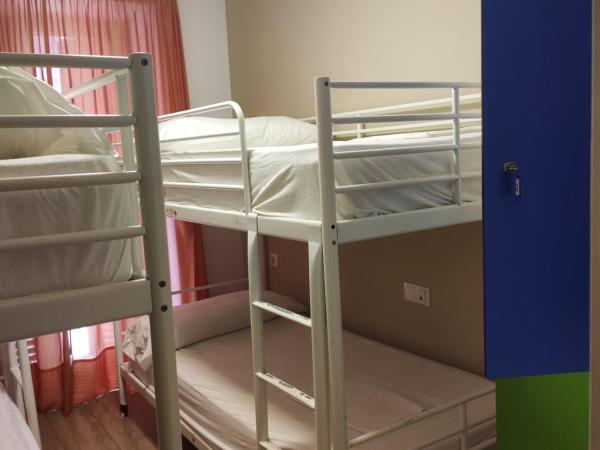 Pensión San Fermín : photo 2 de la chambre lit dans un dortoir de 4 lits