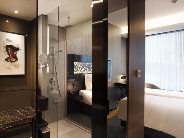 Novotel Singapore On Stevens : photo 8 de la chambre suite lit king-size premier