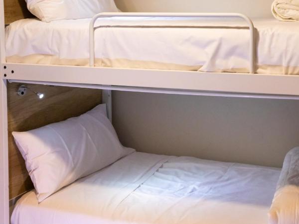 4U Hostel : photo 2 de la chambre lit dans dortoir mixte de 4 lits