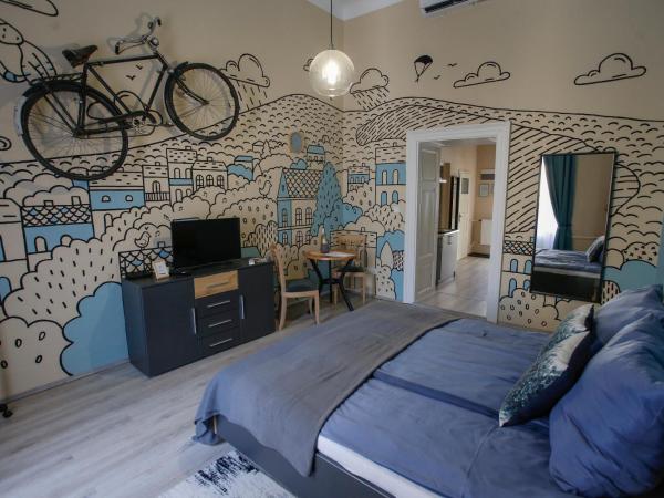 Uránia Apartmanház : photo 10 de la chambre studio