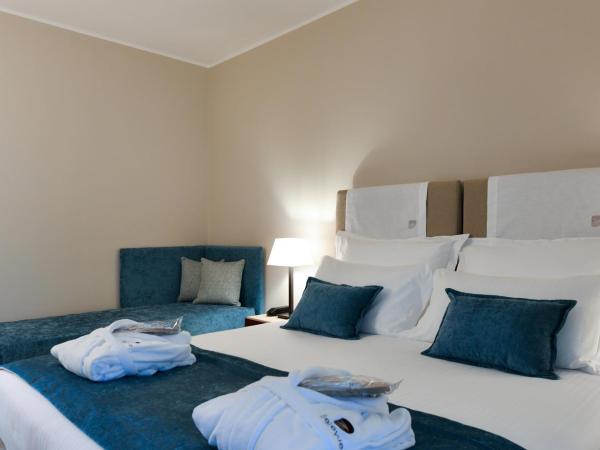 Bellevue Hotel & Resort : photo 4 de la chambre superior triple room with pinewood view sea side