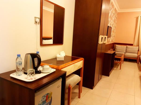 Al Ghubrah Plaza Hotel : photo 6 de la chambre chambre lits jumeaux deluxe