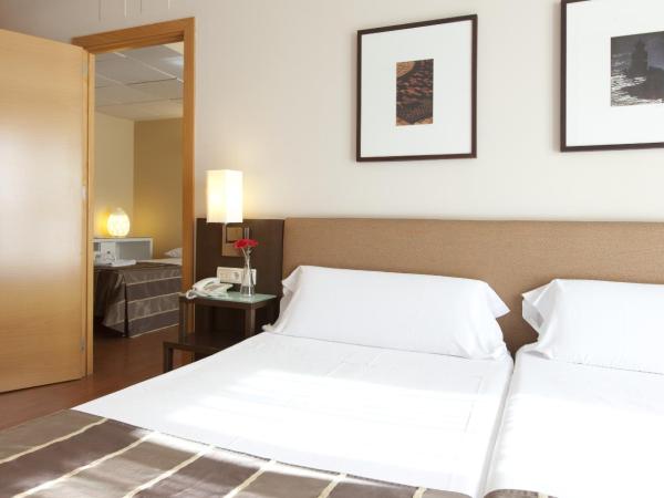 Vértice Sevilla : photo 3 de la chambre chambre familiale (3 adultes + 1 enfant)