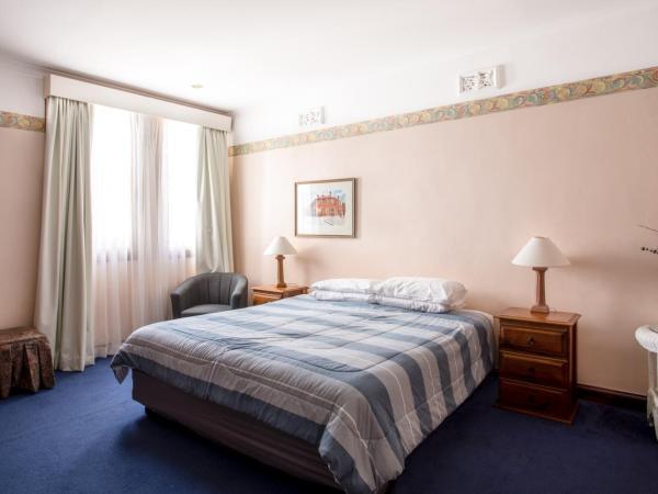 Battery Point Manor : photo 2 de la chambre chambre lit king-size - 7