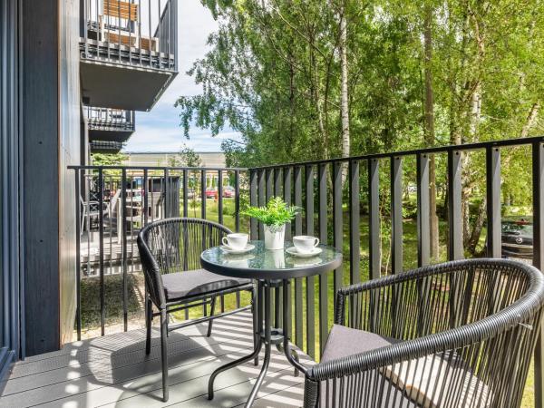 Apartamenty Koło Brzegu by Noclegi Renters : photo 5 de la chambre appartement avec balcon