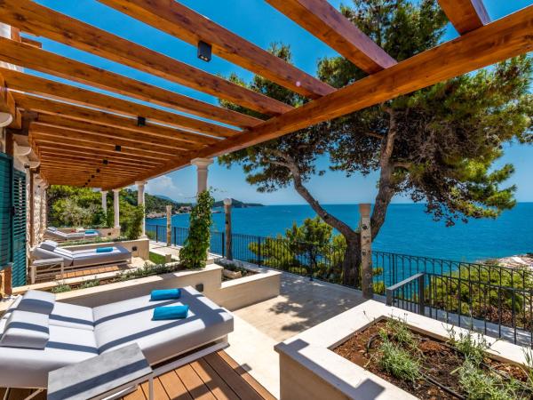 Villa Orabelle : photo 9 de la chambre chambre supérieure avec terrasse - vue sur mer