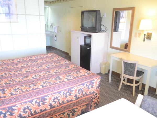Scottish Inn and Suites NRG Park/Texas Medical Center - Houston : photo 4 de la chambre chambre lit king-size