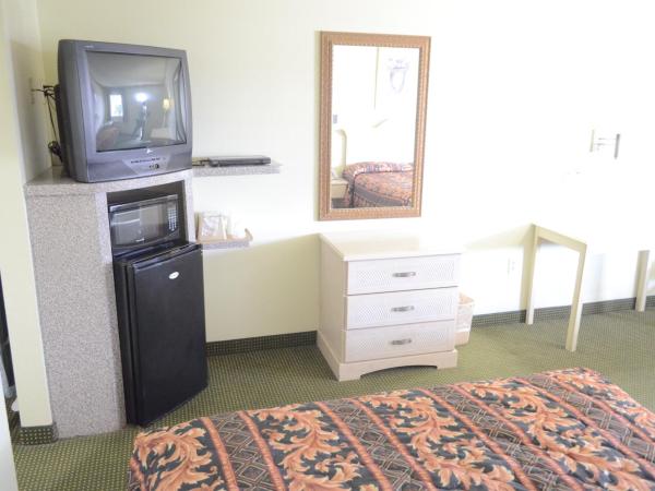 Scottish Inn and Suites NRG Park/Texas Medical Center - Houston : photo 7 de la chambre chambre lit king-size