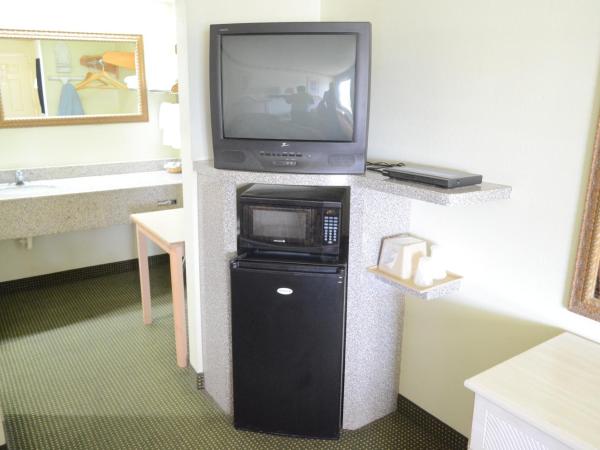 Scottish Inn and Suites NRG Park/Texas Medical Center - Houston : photo 5 de la chambre chambre lit king-size