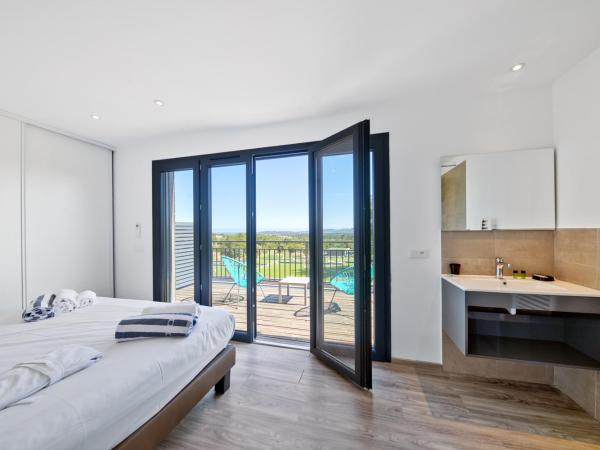 Résidence Pierre & Vacances Premium Les Terrasses d'Arsella : photo 4 de la chambre maison 3 chambres en duplex avec climatisation, piscine privée de 4 mètres et terrasse (6 adultes)
