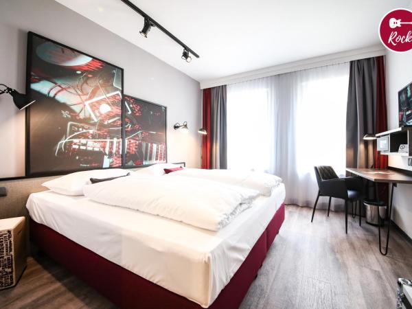 arte Hotel Wien Stadthalle : photo 1 de la chambre chambre double premium rock and roll