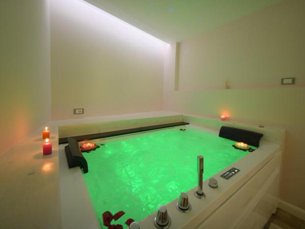 Belgodere di Mezzavia Apartments : photo 7 de la chambre suite deluxe avec baignoire spa