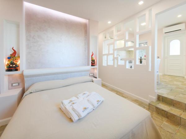 Belgodere di Mezzavia Apartments : photo 5 de la chambre suite deluxe avec baignoire spa