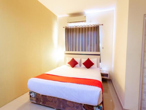 Pratisarawirya Guesthouse by ecommerceloka : photo 1 de la chambre chambre double standard