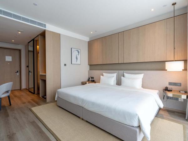 Novotel Shanghai Qingpu Excellence : photo 1 de la chambre chambre lit king-size standard