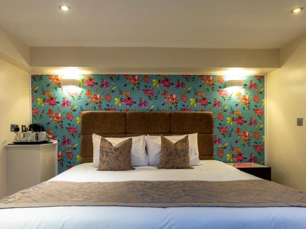 Hotel Shepherds Bush London : photo 1 de la chambre chambre quadruple avec douche