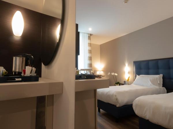 UNAHOTELS MH Matera : photo 4 de la chambre chambre lits jumeaux confort