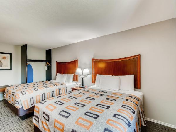 Orangewood Inn and Suites Midtown : photo 1 de la chambre chambre lit queen-size 