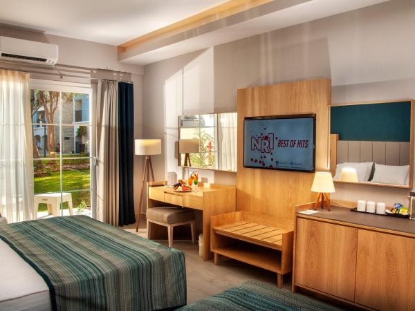 Ephesia Holiday Beach Club : photo 3 de la chambre chambre double ou lits jumeaux supérieure - vue sur jardin