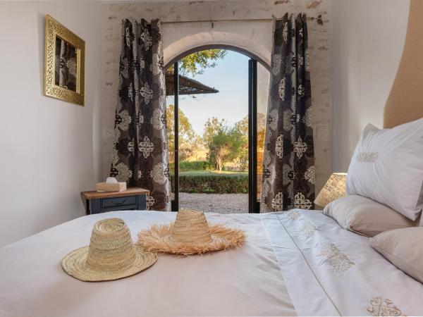 Absolu Beldi Essaouira : photo 1 de la chambre chambre lit king-size - vue sur piscine