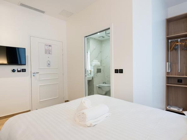 HOTEL AU COEUR DES ARTS ET METIERS : photo 3 de la chambre chambre double - rez-de-chaussée