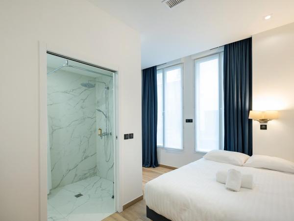 HOTEL AU COEUR DES ARTS ET METIERS : photo 2 de la chambre chambre double - rez-de-chaussée