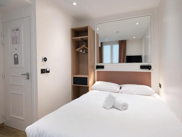 HOTEL AU COEUR DES ARTS ET METIERS : photo 1 de la chambre chambre double – vue sur cour