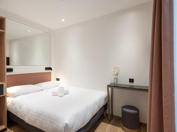 HOTEL AU COEUR DES ARTS ET METIERS : photo 2 de la chambre chambre double – vue sur cour
